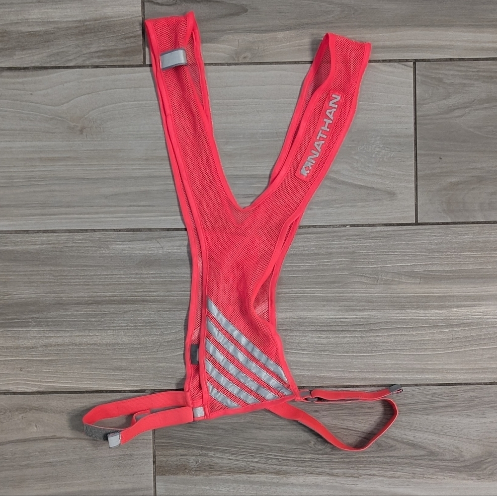 Nathan Lightweight Mesh Reflective Running Vest With Small Pocket In Neon Pink